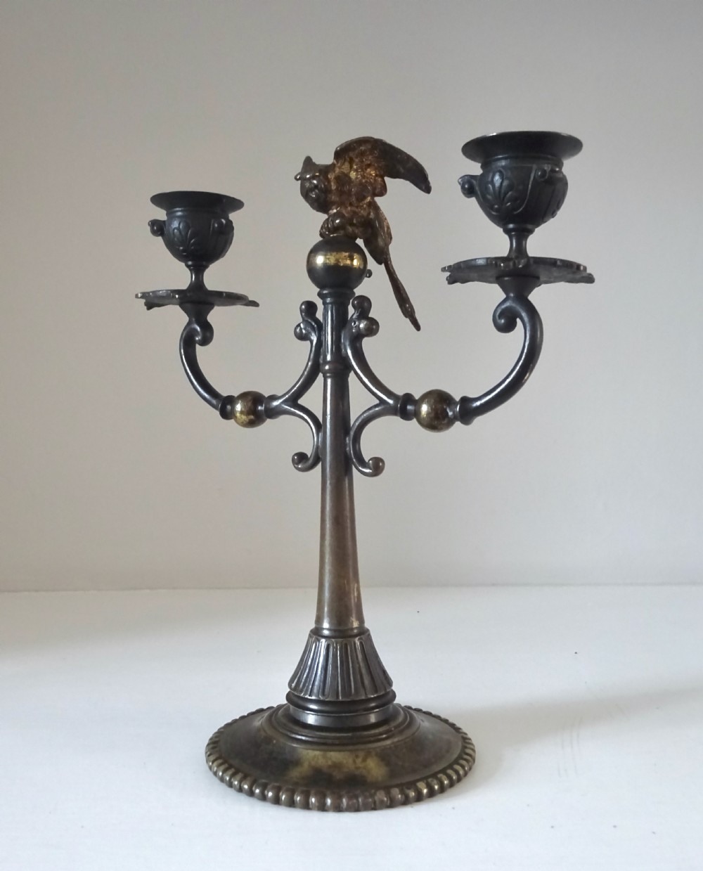 BRONZE CANDLESTICK WITH A PARROT ON THE TOP View V