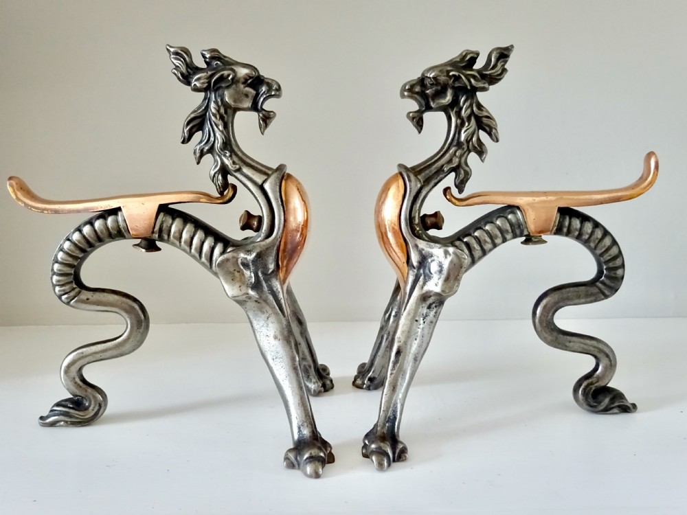 PAIR OF IRON AND COPPER DRAGON FIRE DOGS