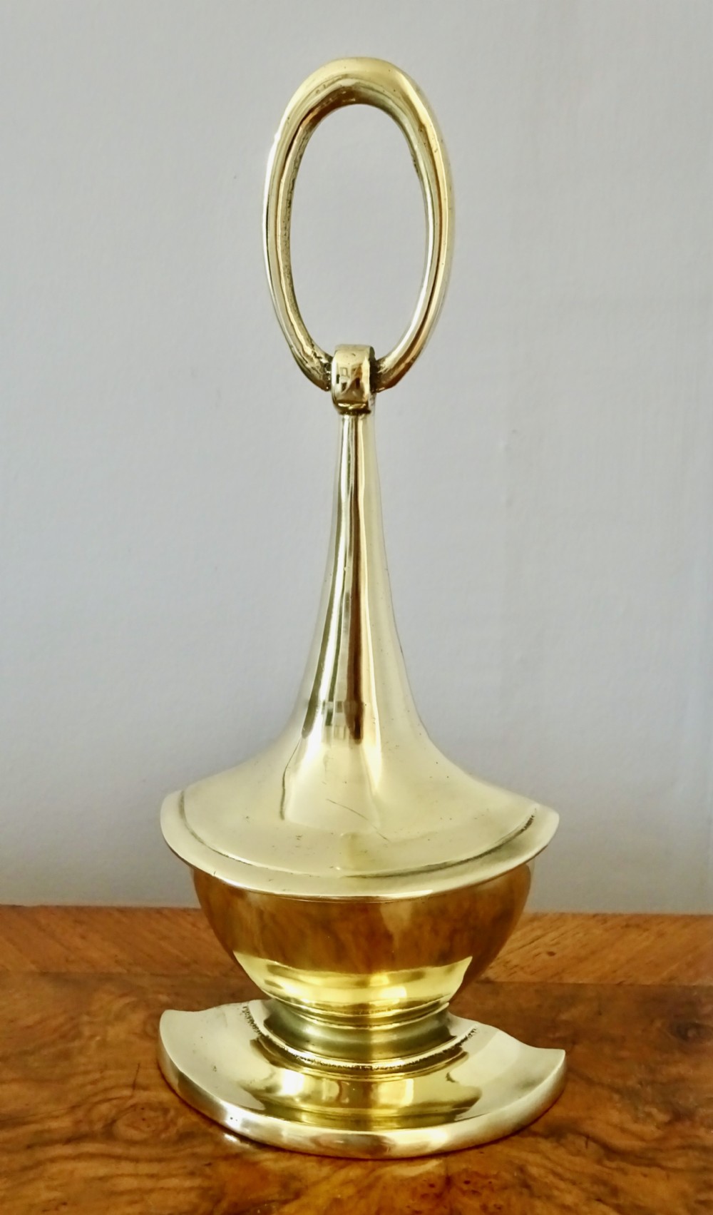 ELEGANT BRASS DOORSTOP MARKED 'ENGLAND'
