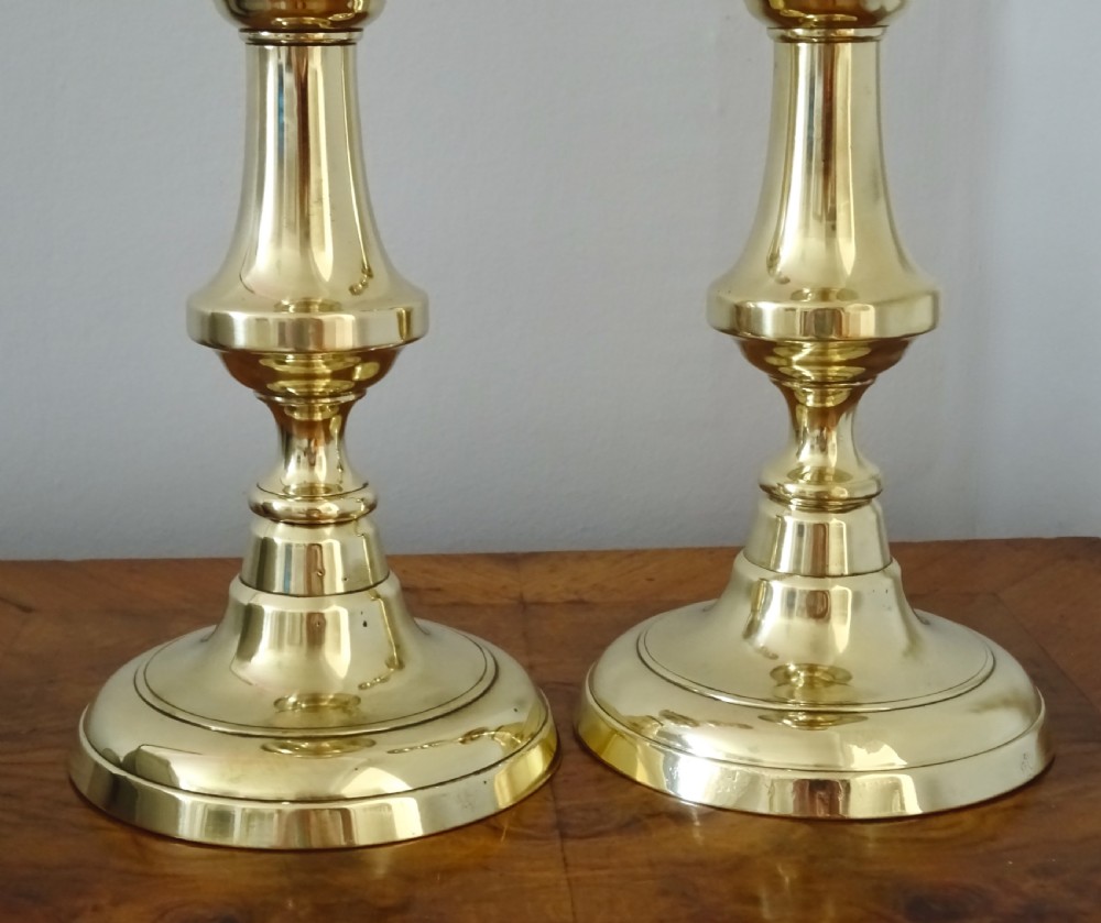 PAIR OF VICTORIAN BRASS CANDLESTICKS View II