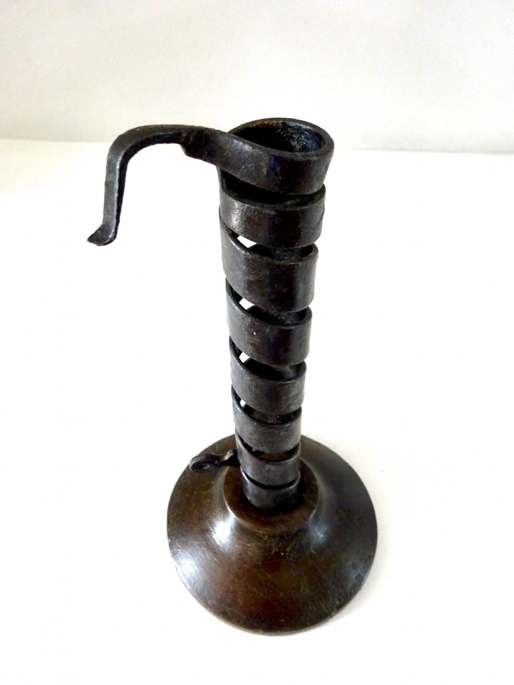 19thC IRON PIGTAIL SPIRAL CANDLESTICK  View III