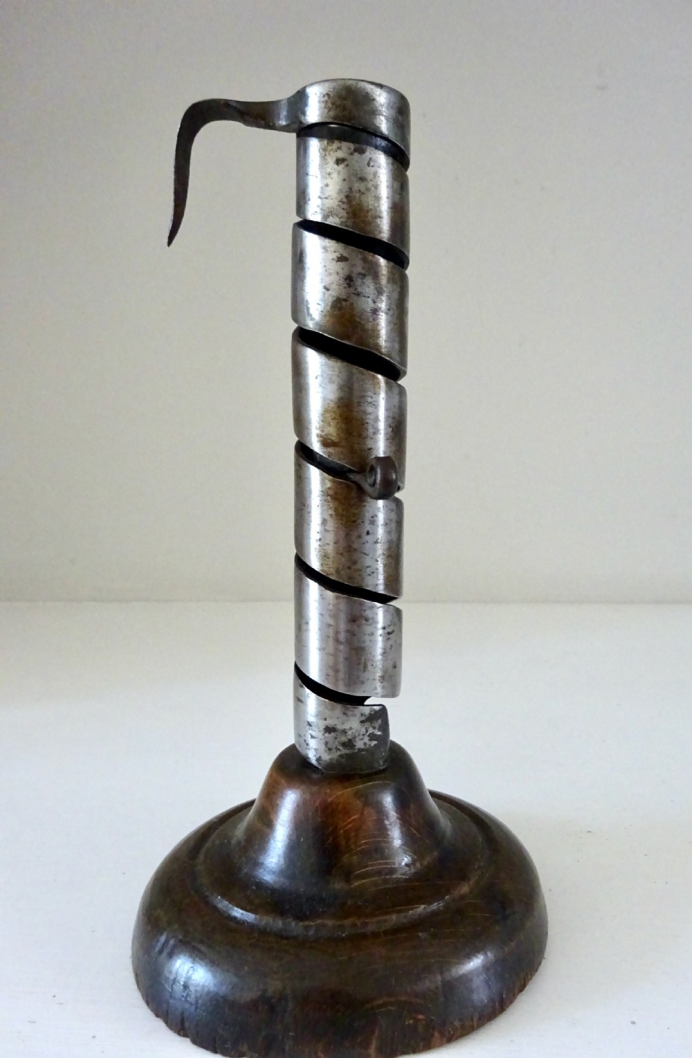 1860-90 AN IRON SPIRAL CANDLESTICK 