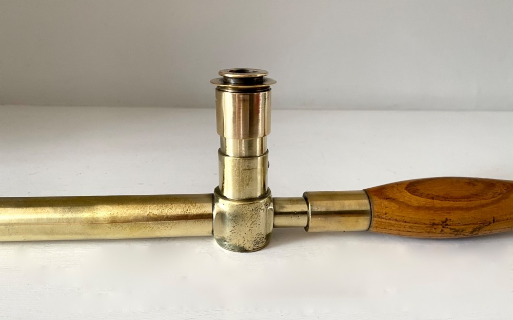 A brass trench periscope stamped PERISCOPE MK IX 1918 R. & J. BECK LTD. NO 2310. View VII