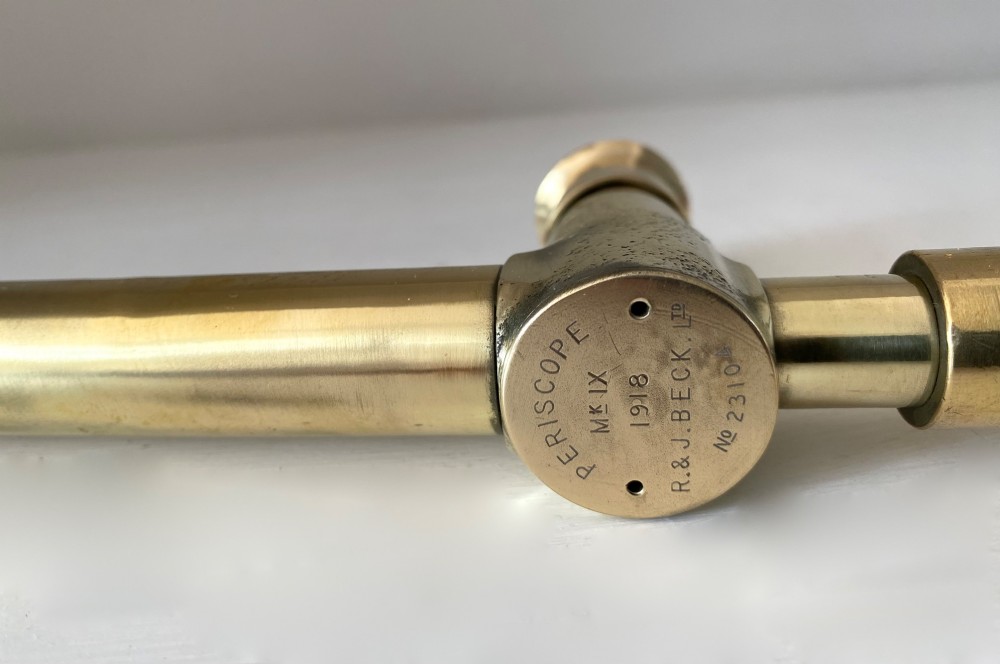A brass trench periscope stamped PERISCOPE MK IX 1918 R. & J. BECK LTD. NO 2310. View VIII
