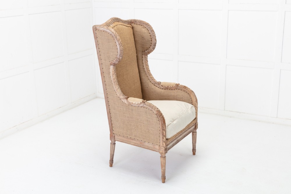 19th Century French Carved Wood Wing Chair