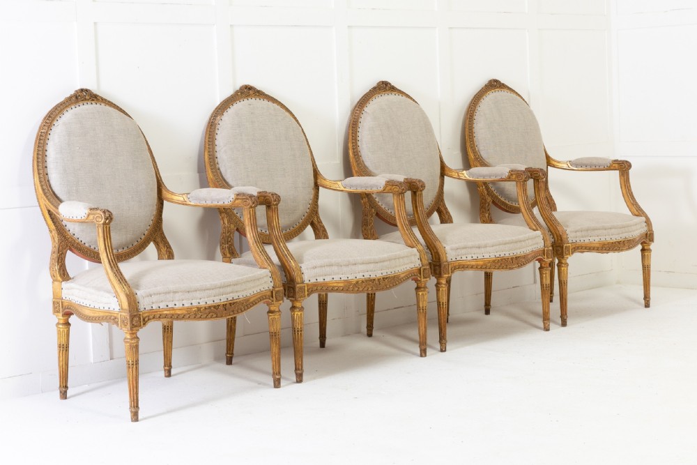 Set of Four 1920s French Gilt Carved Wood Armchairs View II