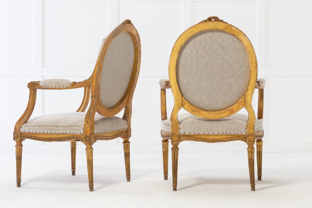 Set of Four 1920s French Gilt Carved Wood Armchairs View X