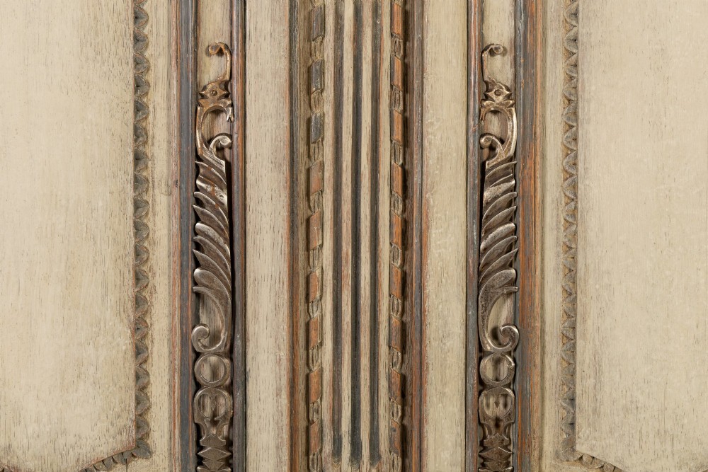 An eighteenth-century carved French painted oak armoire featuring two doors with ornate floral mouldings and short cabriole feet. View XI