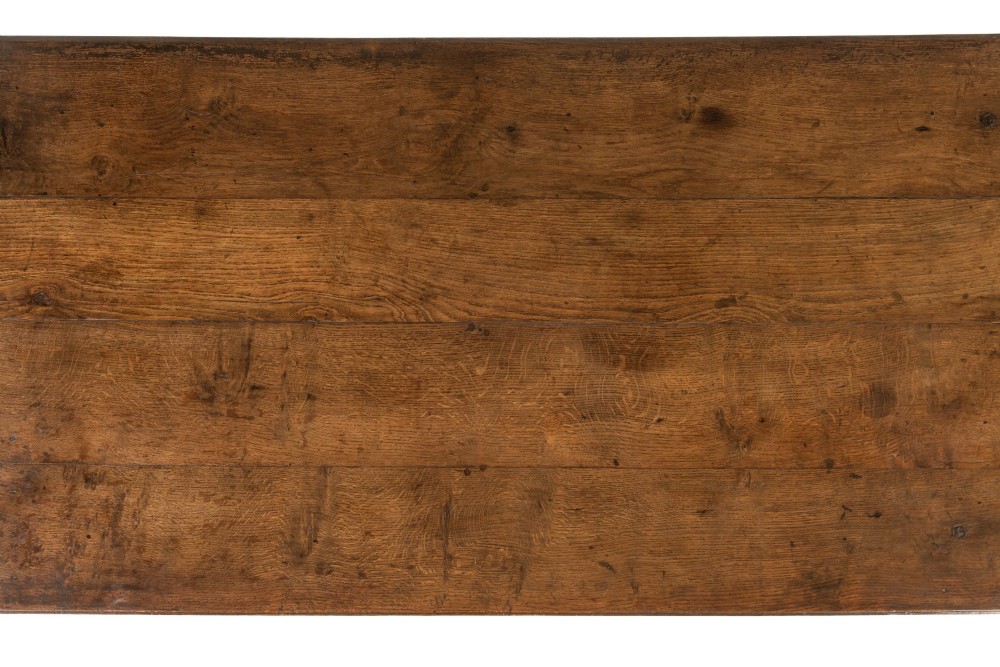 An 18th-century George III oak farmhouse dining table with a rectangular plank top and straight legs joined by low stretchers. View IV