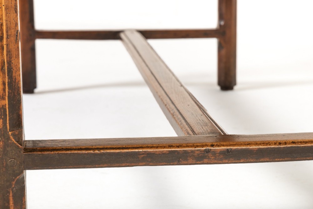 An 18th-century George III oak farmhouse dining table with a rectangular plank top and straight legs joined by low stretchers. View VIII
