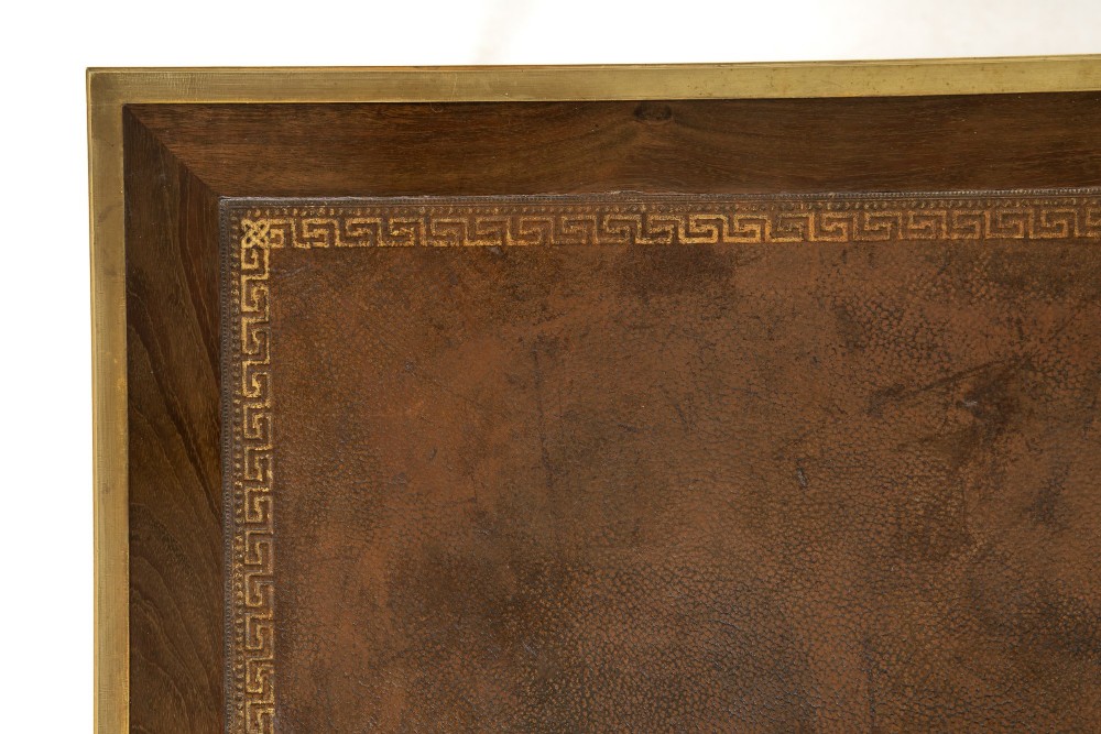 A 19th-century French Louis XVI style bureau plat writing desk featuring geometric parquetry inlay, three frieze drawers, a leather top insert, and brass mounts on square tapered legs. View VIII