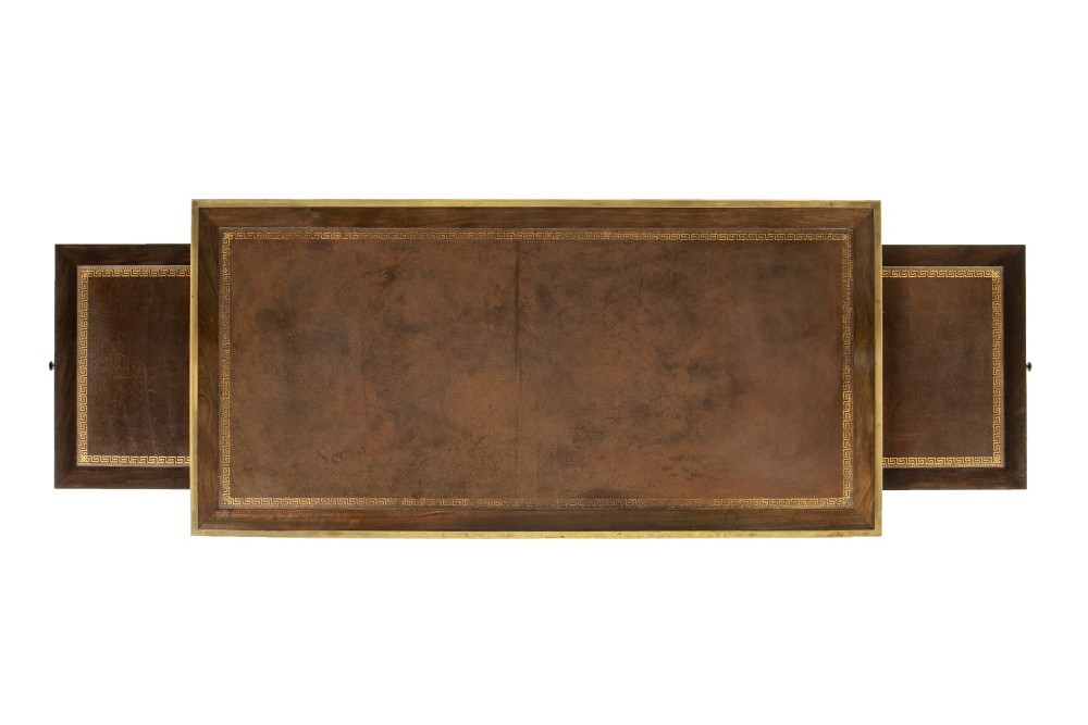 A 19th-century French Louis XVI style bureau plat writing desk featuring geometric parquetry inlay, three frieze drawers, a leather top insert, and brass mounts on square tapered legs. View IX