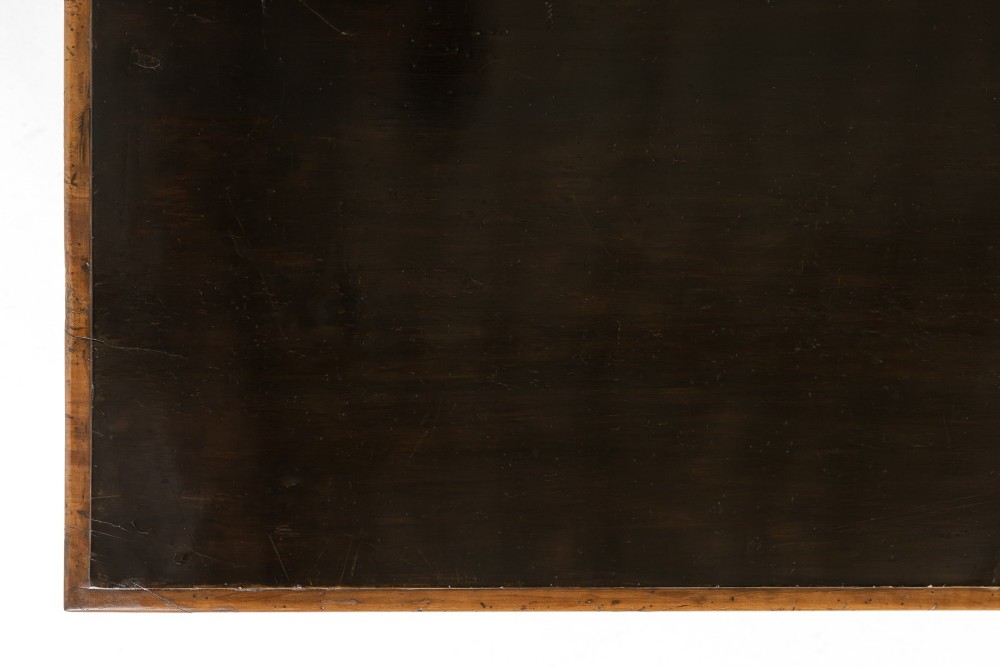 An 18th-century Italian walnut chest of drawers featuring foliage marquetry, brass drop handles, and geometric side moulding. View V