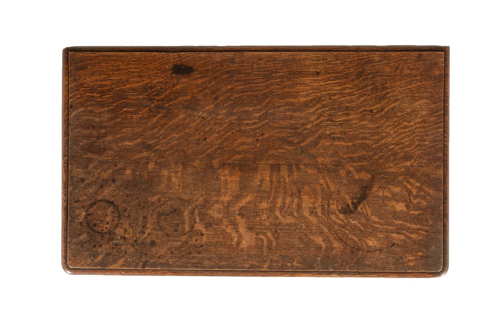 An 18th-century dark oak lowboy table featuring three drawers with brass handles, a shaped apron, and cabriole legs terminating in pad feet. View IX