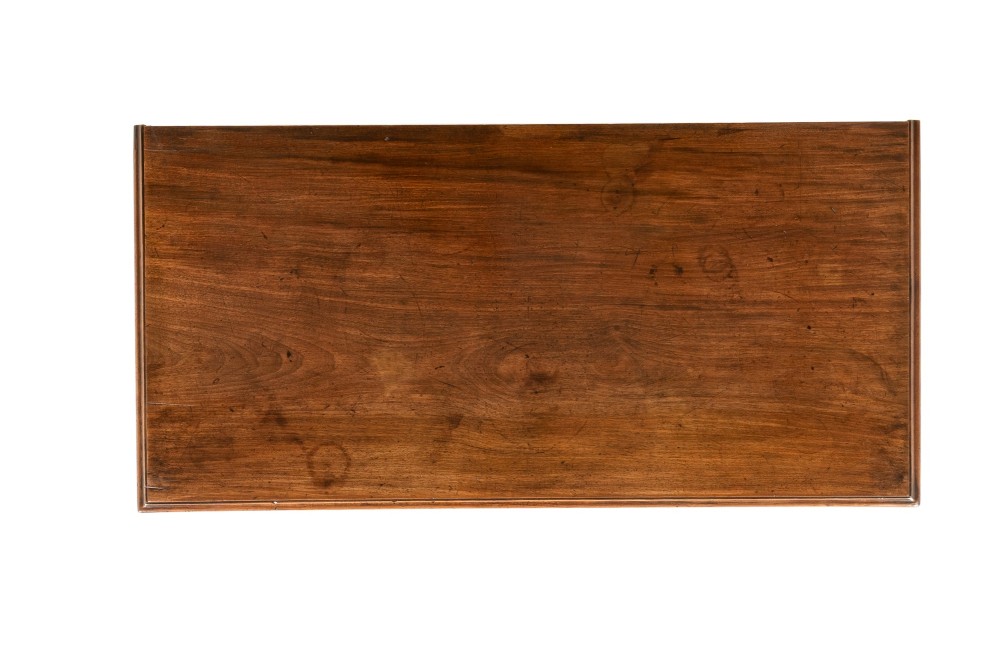 An 18th-century George III mahogany chest of drawers featuring two short over three long graduated drawers with brass swan-neck handles and bracket feet. View VII