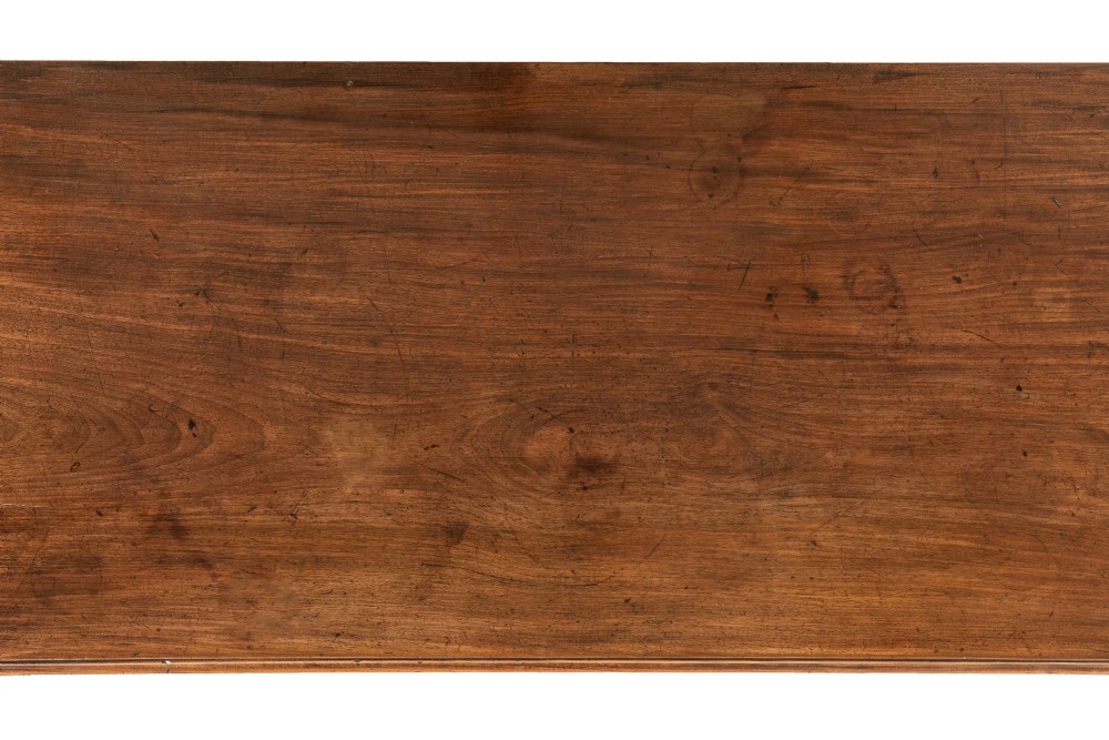 An 18th-century George III mahogany chest of drawers featuring two short over three long graduated drawers with brass swan-neck handles and bracket feet. View VIII