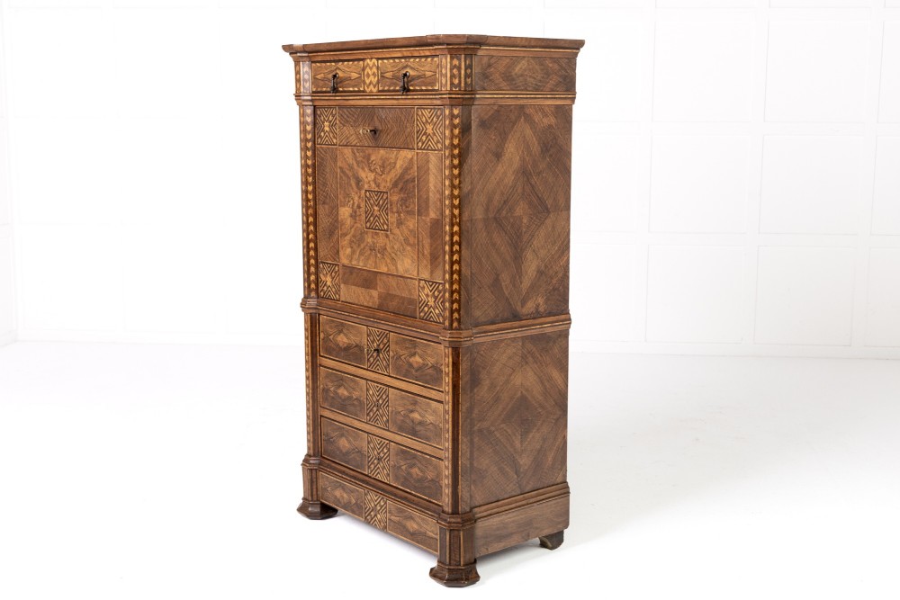 A tall nineteenth-century Italian secretaire cabinet featuring geometric marquetry veneer, a drop-front fall, and stacked drawers. View II