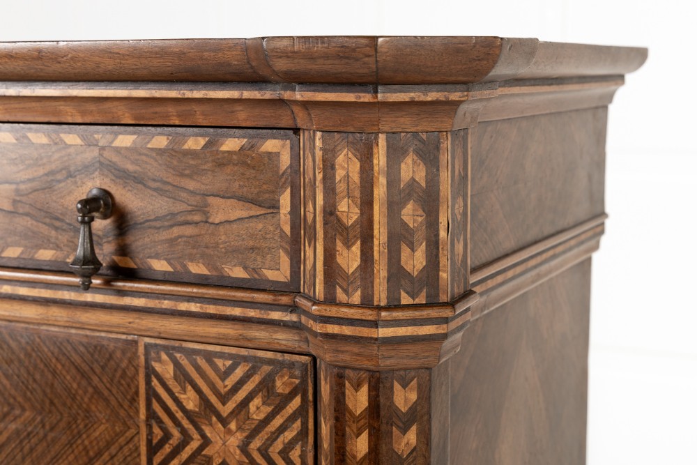A tall nineteenth-century Italian secretaire cabinet featuring geometric marquetry veneer, a drop-front fall, and stacked drawers. View IV