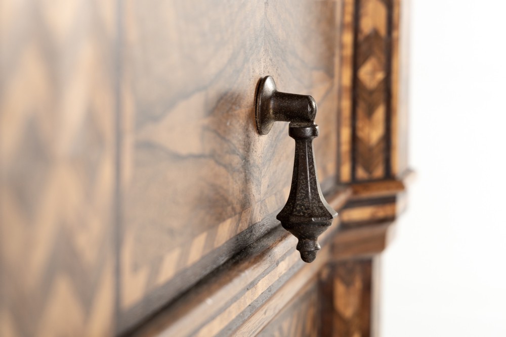 A tall nineteenth-century Italian secretaire cabinet featuring geometric marquetry veneer, a drop-front fall, and stacked drawers. View XII