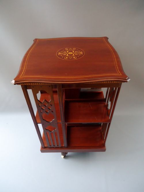 A Mahogany Serpentine Shape Revolving Bookcase