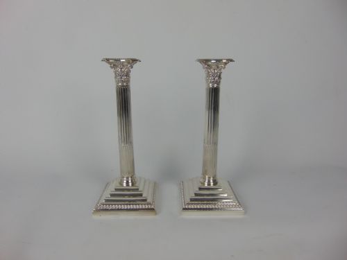 A Fine Pair of Silver Candlesticks