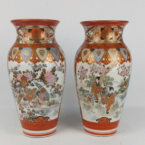 fig 1. A pair of baluster-shaped Japanese Kutani porcelain vases decorated with hand-painted birds, flowers, iron-red panels, and gold accents.