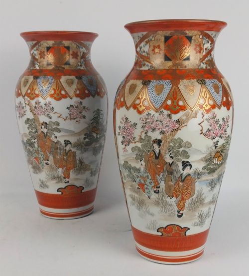 fig 4. A pair of baluster-shaped Japanese Kutani porcelain vases decorated with hand-painted birds, flowers, iron-red panels, and gold accents.