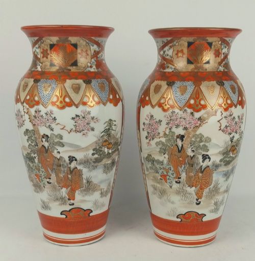 fig 5. A pair of baluster-shaped Japanese Kutani porcelain vases decorated with hand-painted birds, flowers, iron-red panels, and gold accents.
