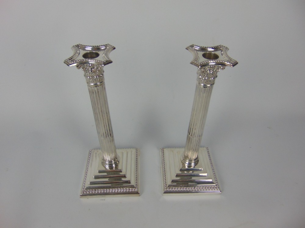 A fine pair of silver candlesticks  View III