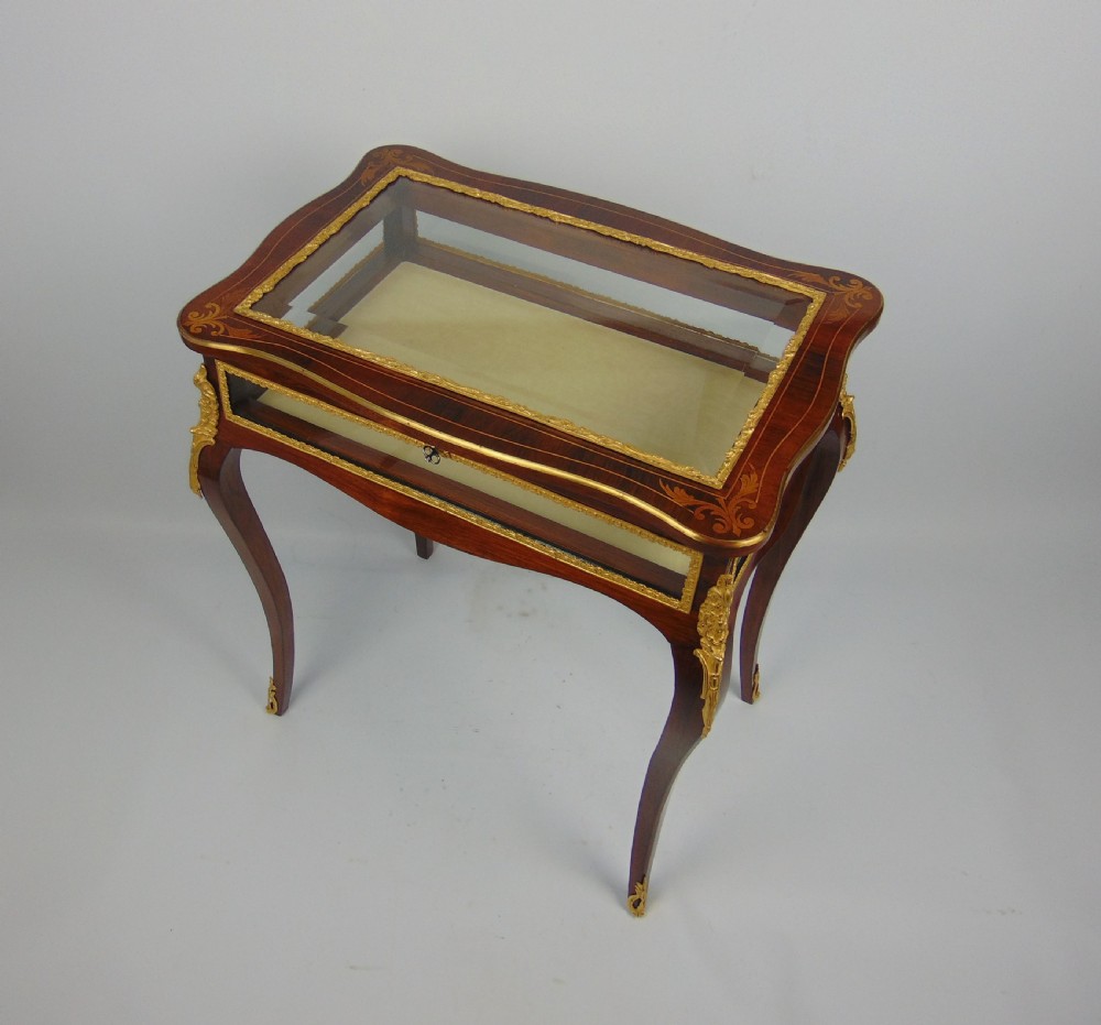 A fine rosewood bijouterie bijouterie display table  View II