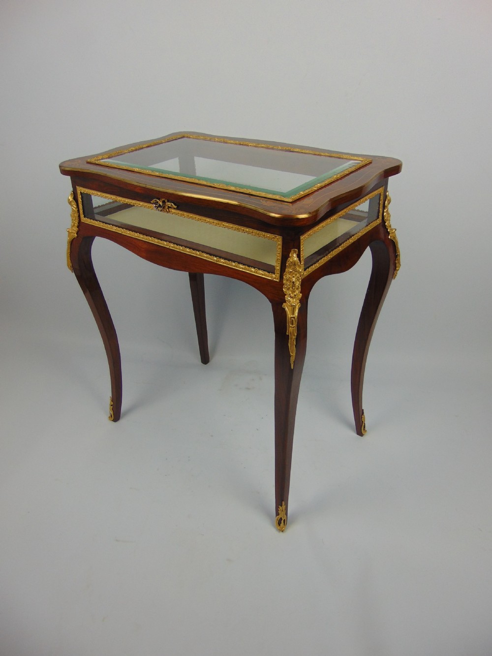 A fine rosewood bijouterie bijouterie display table  View III