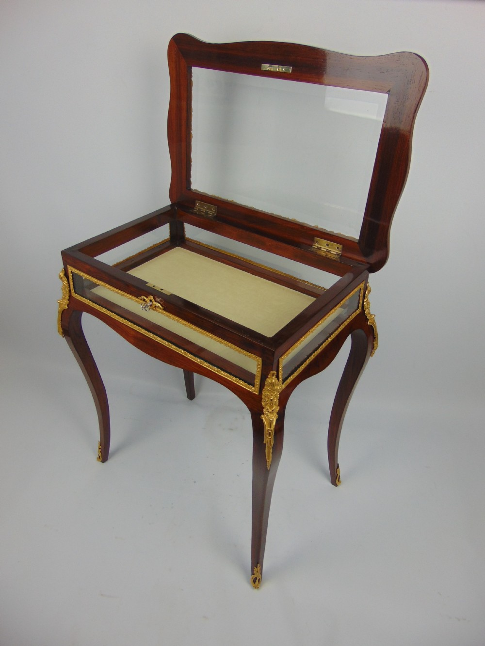 A fine rosewood bijouterie bijouterie display table  View IV