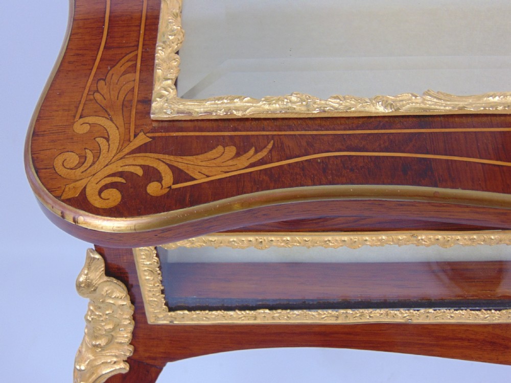 A fine rosewood bijouterie bijouterie display table  View V