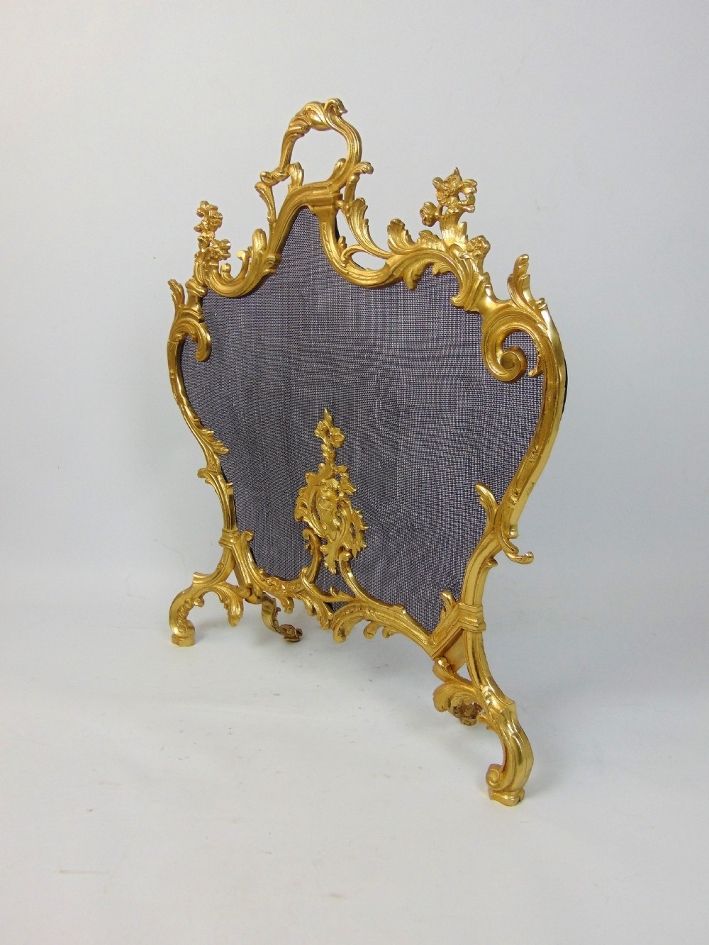 A fabulous gilt bronze fire screen View II