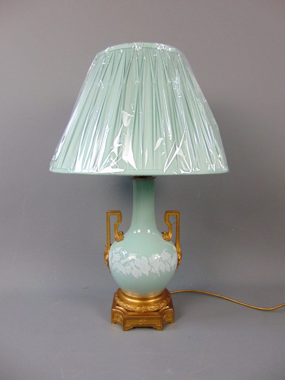 A porcelain duck egg blue lamp