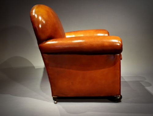 fig 3. Antique Pair of Leather Armchairs