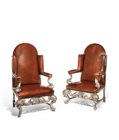 Antique Pair of Silver Gilt Leather Upholstered Wing Chairs