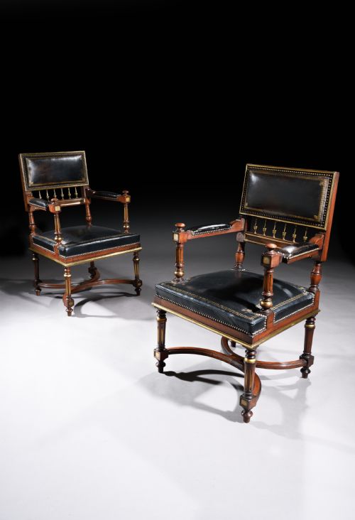 A Matched Pair of 19th Century French Brass Mounted and Leather Armchairs