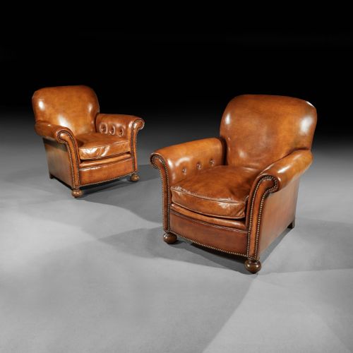 Antique Pair of Leather Upholstered Club Armchairs.
