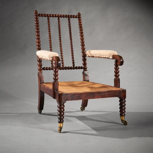 19th Century Faux Rosewood Bobbin Turned Open Armchair on Brass Cup Castors