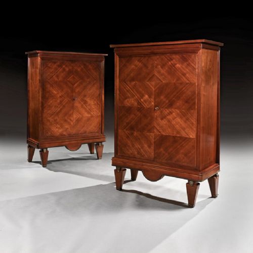 A Rare Pair of French Mahogany and Brass Mounted Cabinets Andre Arbus.