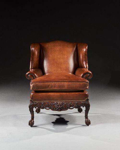 fig 1. Fine 19th Century Mahogany Leather Upholstered Wingback Armchair in the George II Manner