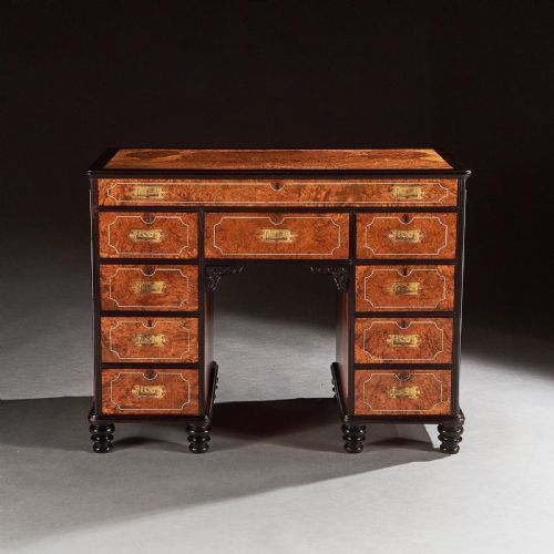 A FINE CHINESE EXPORT AMBOYNA AND EBONY CAMPAIGN KNEEHOLE DESK - ADDITIONAL PHOTO 1
