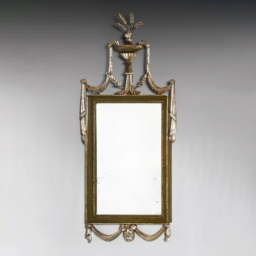 fig 3. A set of three 19th-century Neoclassical wall mirrors featuring green painted and silvered frames topped with carved urn finials and drapery swags.