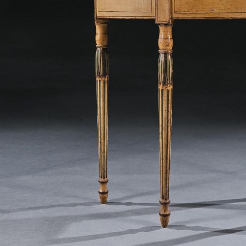 fig 1. A Georgian painted demi-lune pier table featuring a semi-circular top with polychrome painted borders and four fluted tapered legs.