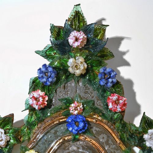 fig 3. A pair of 18th-century Venetian Murano glass wall mirrors featuring decorative glass foliage, colourful glass flowers, etched central mirror plates, and gilt accents.