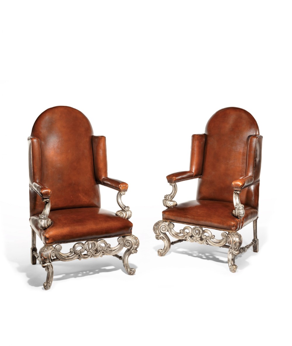 Antique Pair of Silver Gilt Leather Upholstered Wing Chairs