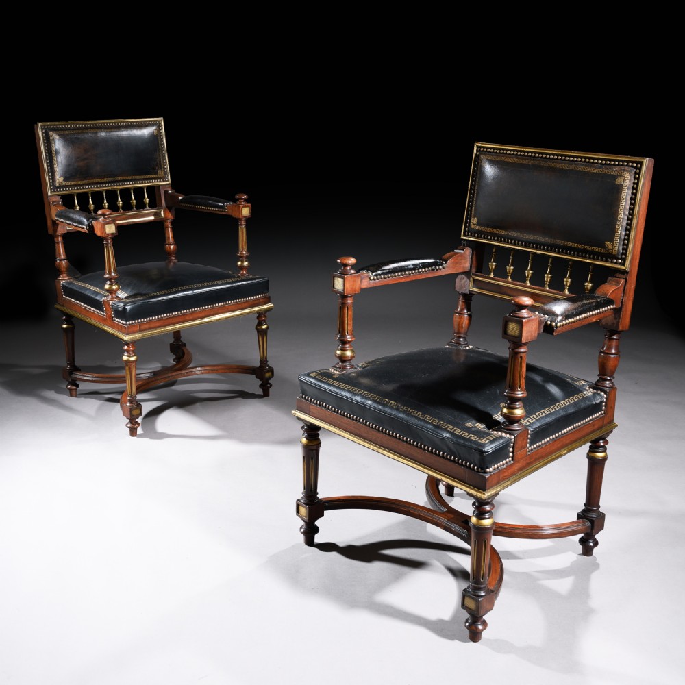 A Matched Pair of 19th Century French Brass Mounted and Leather Armchairs  View II