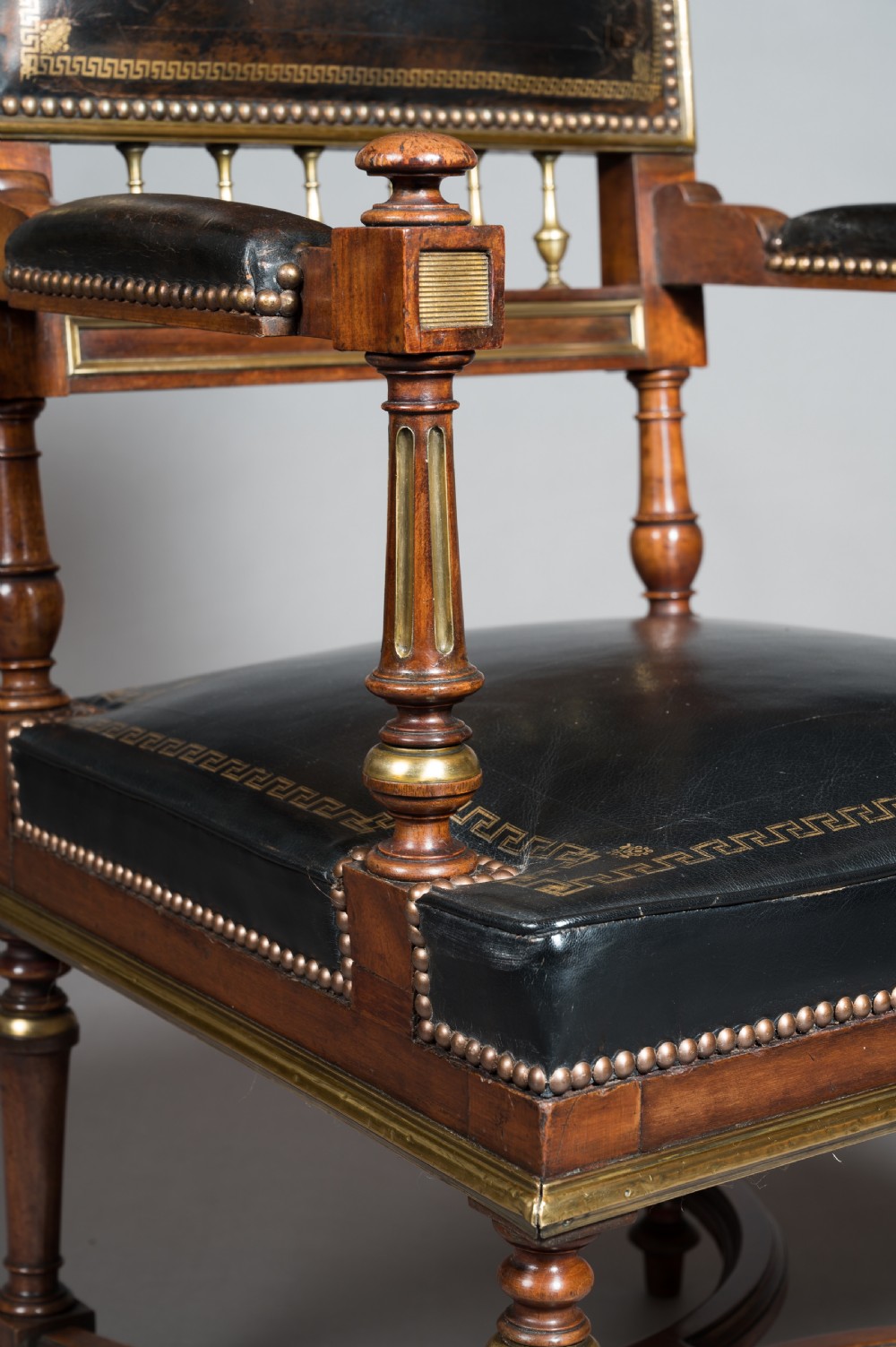 A Matched Pair of 19th Century French Brass Mounted and Leather Armchairs  View VII