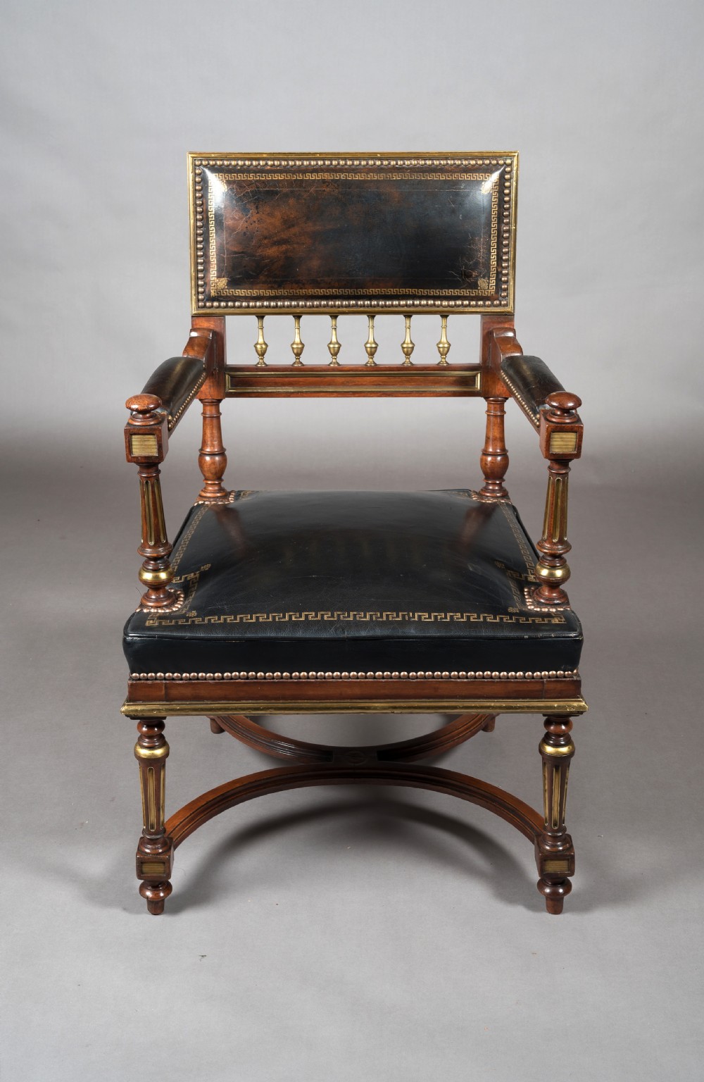 A Matched Pair of 19th Century French Brass Mounted and Leather Armchairs  View VIII